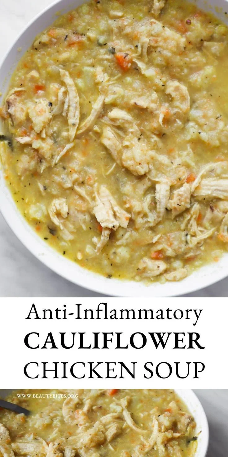 Bowl of 30-minute cauliflower chicken soup garnished with herbs.