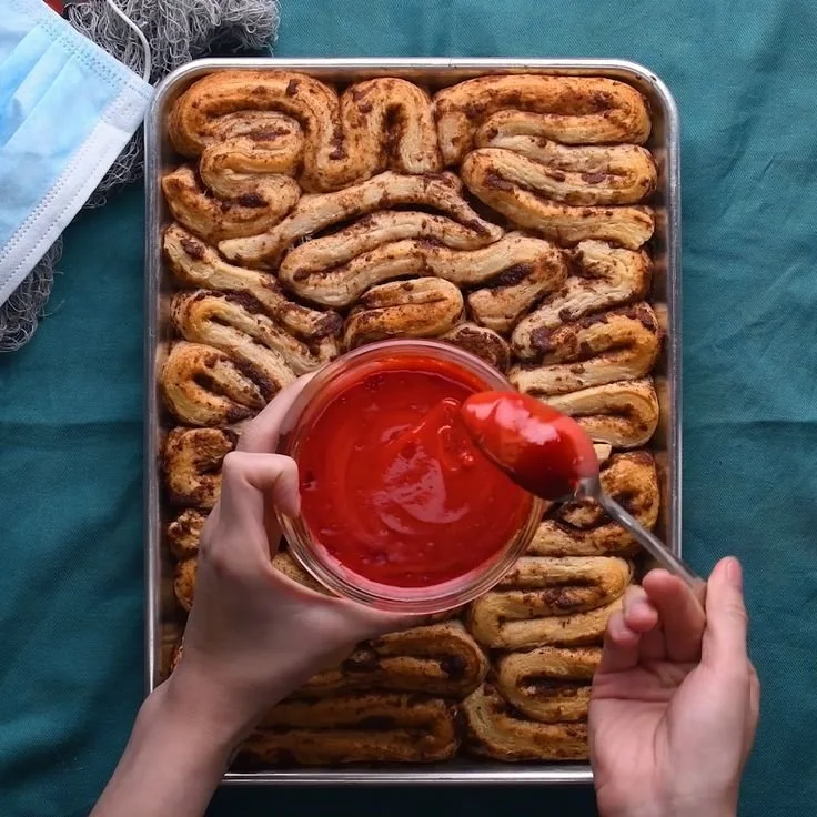 Delicious edible intestines cinnamon rolls ready to be enjoyed for breakfast.