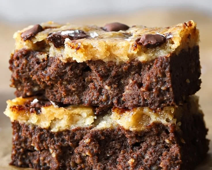 Greek Yogurt Blondie Brownies served on a plate with chocolate drizzle.