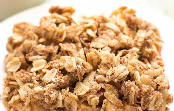 Healthy chai spice apple crumble topped with oats and nuts