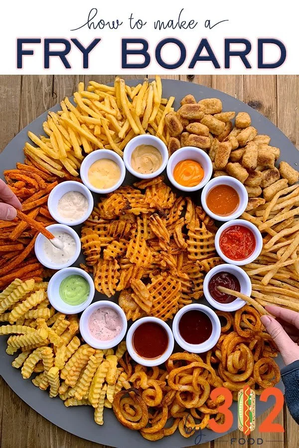 Delicious French fry board with various dipping sauces and toppings