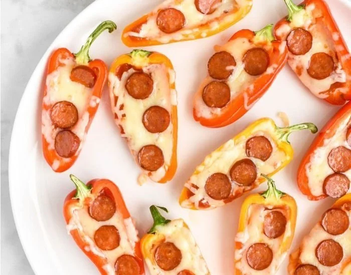 Delicious pizza stuffed mini peppers on a platter