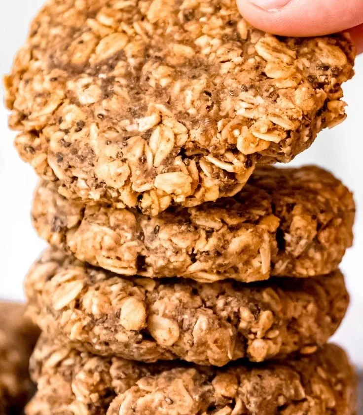 Baked protein-packed oatmeal cookies on a wooden plate