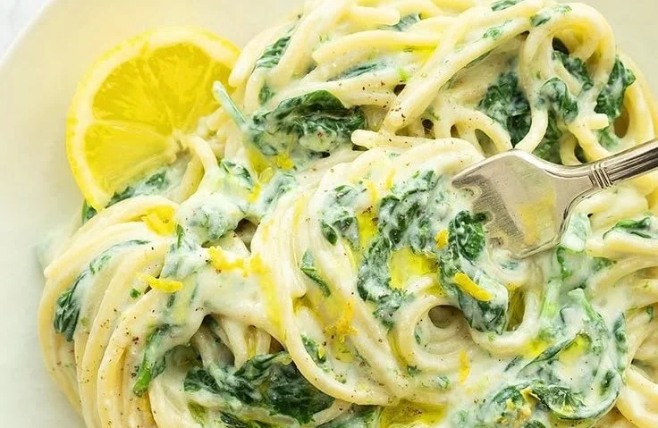 Delicious quick lemon ricotta pasta topped with fresh herbs and lemon zest.