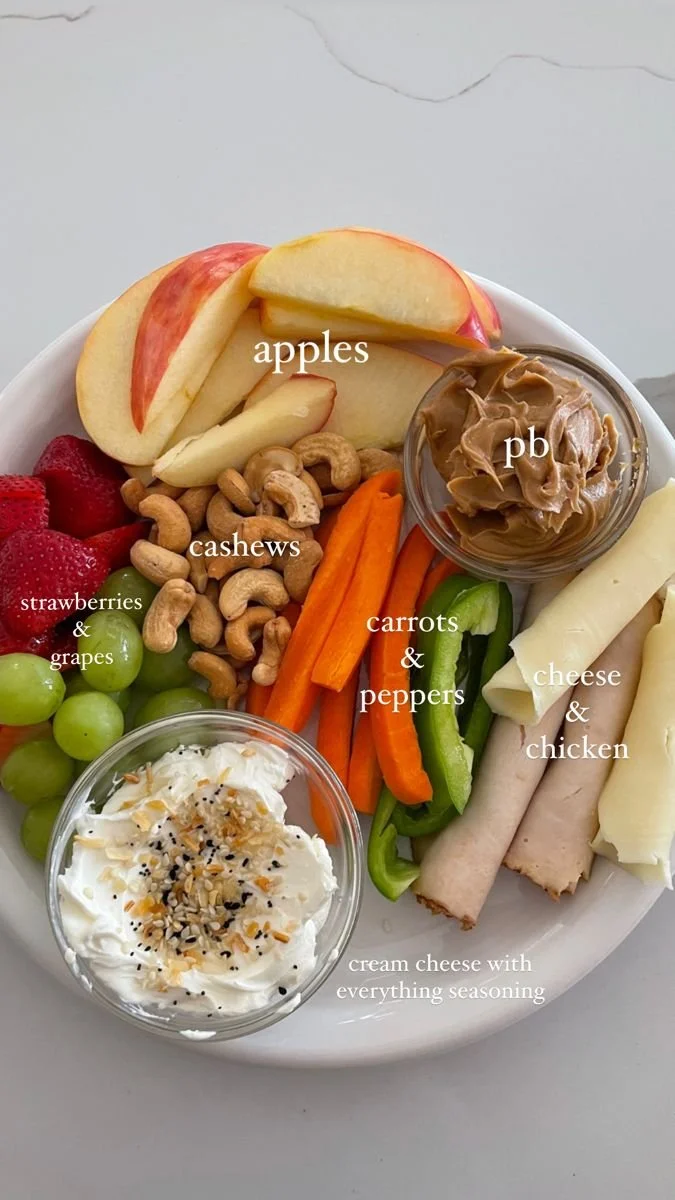 Quick snack board with assorted cheeses, fruits, and nuts ready for sharing.