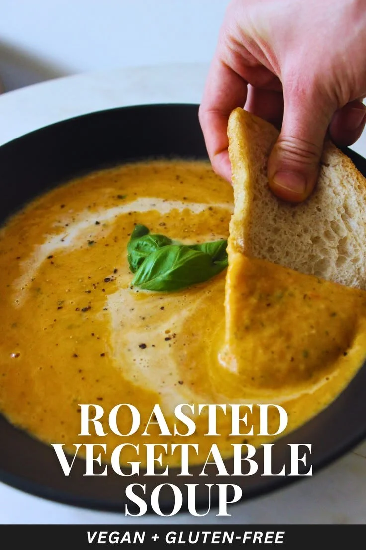 Bowl of delicious roasted veggie soup with colorful vegetables